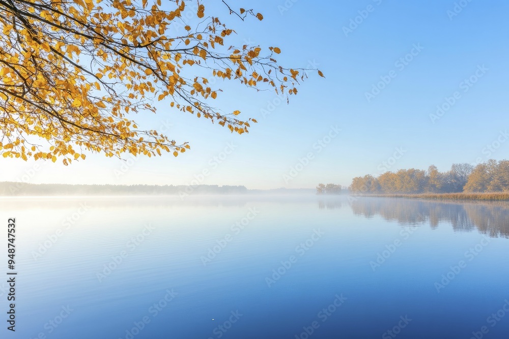 Obraz premium A tranquil lake reflecting the golden hues of dawn, evoking feelings of peaceful harmony and soulful connections
