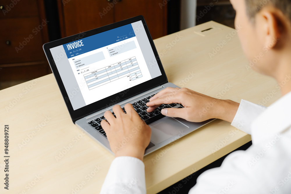 Invoice on computer screen from accounting application. Computer program for financial and budget of corporate business. Snugly. Invoice on computer screen from accounting application. Computer program for financial and budget of corporate business. Snugly.