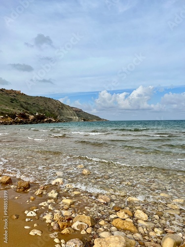 Beautiful sandy beach on the Coast of the island of Gozo, Malta. The Mediterranean Sea.
