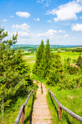 Walking path to top of Cisowa Gora viewpoint, highest peak of the region, Suwalski Landscape Park, Podlasie, Poland photo