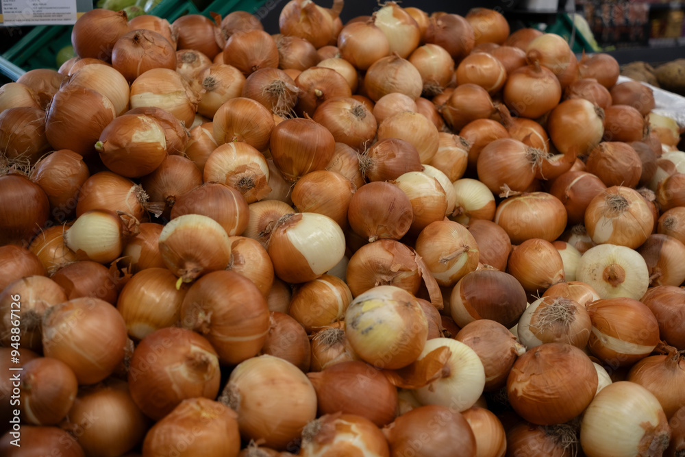 Group of onions in a market stand ready for sell Group of onions in a market stand ready for sell