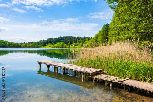 Fototapeta Naklejka Na Ścianę i Meble -  Wooden pier on shore of beautiful Wigry lake, Wigry National Park, Podlasie, Poland