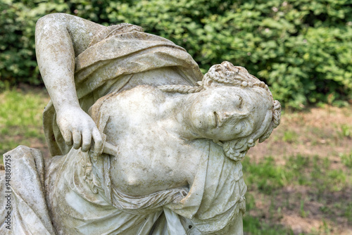 unknown stone statue in the herb garden of the park of the Beeckestein Velsen Estate Netherlands photo