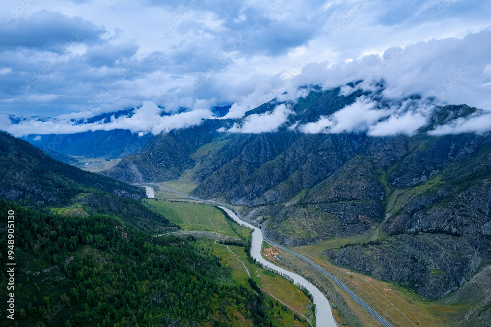 Aerial top view beautiful landscape mountains with fog, green forest and trees in rural Altai, drone photo Aerial top view beautiful landscape mountains with fog, green forest and trees in rural Altai, drone photo