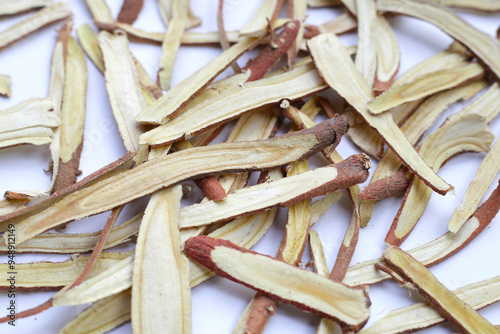 Liquorice sliced on white background.