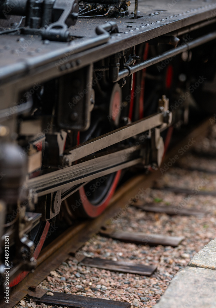 Naklejka premium Vintage museum steam locomotive at the station.