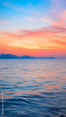 Serene Sundown in the Gulf: A Transparent Dance of Colors Between Sky, Sea, and Land