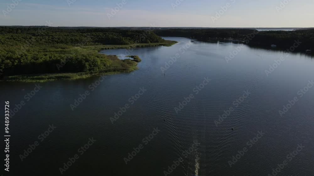 Fly over the a green and scenic nature area called Jabelscher See which is located at the Mecklenburg Vorpommern Lake area as the known former East Germany region Fly over the a green and scenic nature area called Jabelscher See which is located at the Mecklenburg Vorpommern Lake area as the known former East Germany region