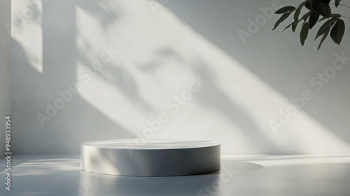 Elegant Product Display with Three White Cylindrical Pedestals in a Softly Lit Minimalist Background