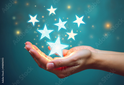 An open hand reaching out, with small, glowing blue and white stars rising from the palm, representing the act of giving. 5th September International Day of Charity.  photo