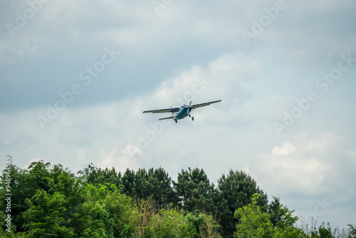 Cessna 208b Grand Caravan G-CPSS light aircraft ascending from take off