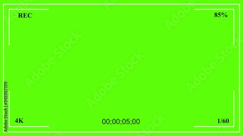 Cinematic camcorder, recorder. viewfinder with green screen, alpha channel. Recording concept with timecode. Plain green screen of camcorder filming with timer, flashing  and battery life photo