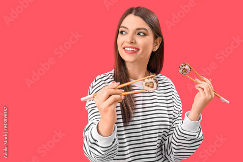 Young woman with sushi on r...