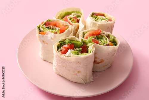 Plate of tasty lavash rolls...