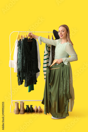 Happy female stylist with c...