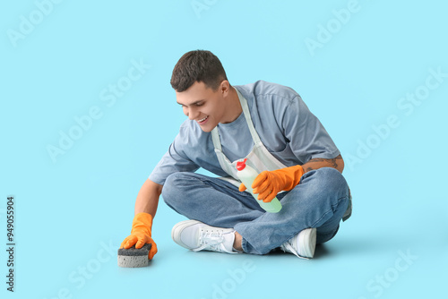 Young tattooed man with spo...