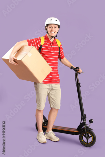 Male courier with big cardb...