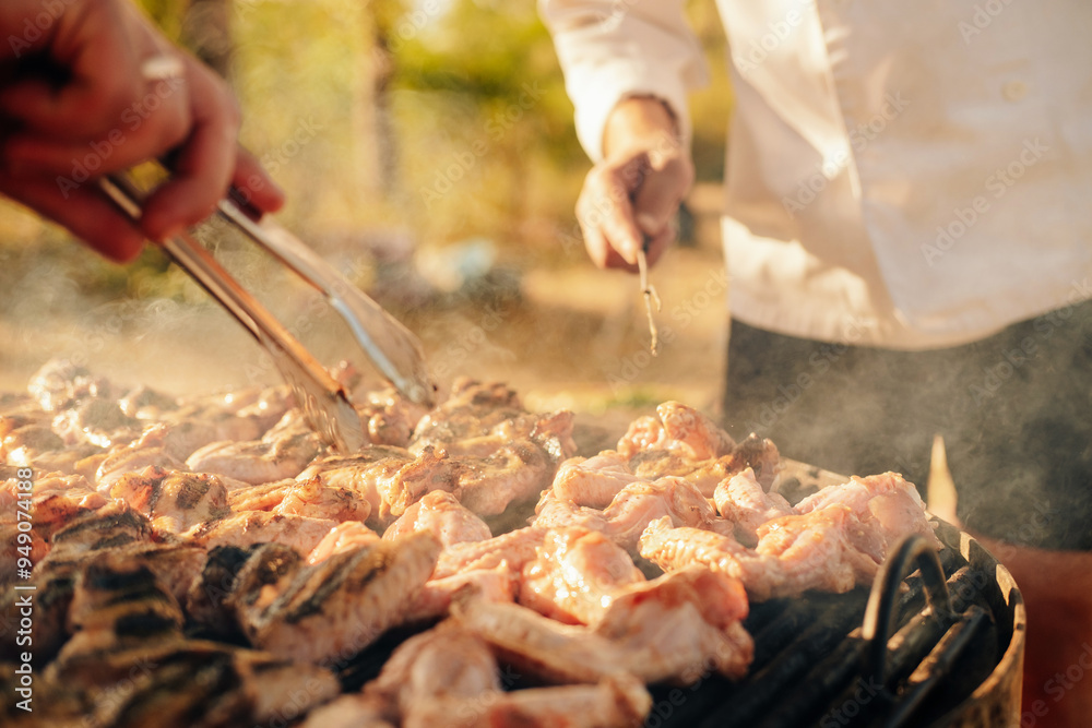 A lively and vibrant outdoor barbecue scene unfolds, with fresh, juicy meat sizzling enticingly on the grill A lively and vibrant outdoor barbecue scene unfolds, with fresh, juicy meat sizzling enticingly on the grill