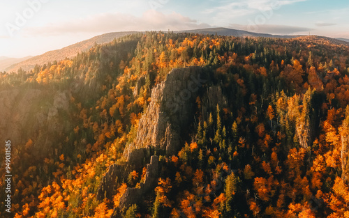 Epic Aerial Autumn Fall Foliage Mountain Landscape in Dixville Notch New Hampshire. New England Wide Vista at Sunset. Green and Yellow Trees photo