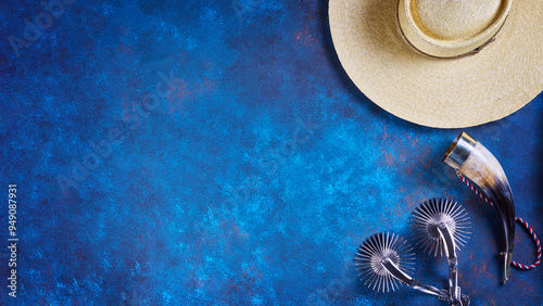 fondo espuelas y cacho emboquillado junto a una chupalla, concepto celebración fiestas patrias chile photo