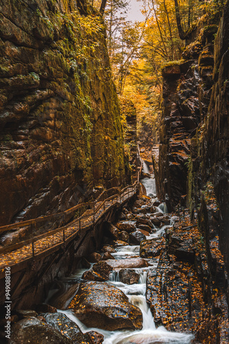 Flume Gorge Franconia Notch State Park Autumn Cascading River Scenic Forest Trail in New Hampshire. Fall Foliage Season Adventure Travel Destination photo