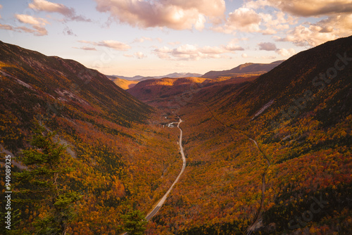 Epic Wide Autumn Scene Mount Willard New Hampshire Landscape Views. Mountain Valley Road Through Yellow Trees New England. Beautiful Nature Landscape photo