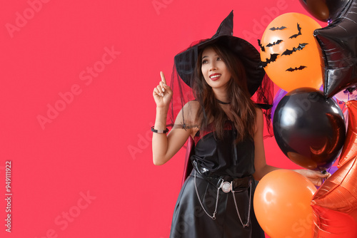 Young Asian woman dressed f...
