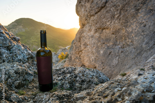 bottle of wine in the mountains