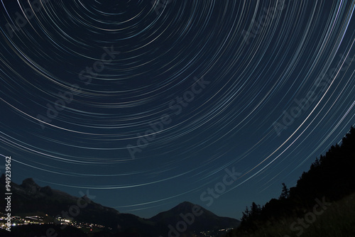 Nocturnal Alpine Landscape With Star Trails