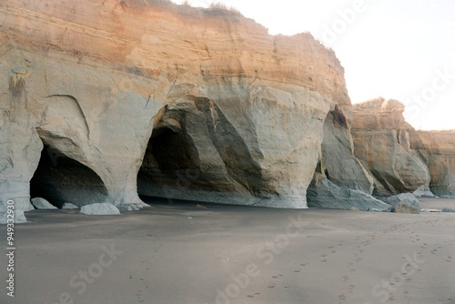 Caves in the coastal rock on the beach, the Waverley Beach Caves photo