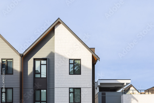 New Modern House Apartment Buildings in Vancouver BC. Canadian modern residential architecture on sunny summer day