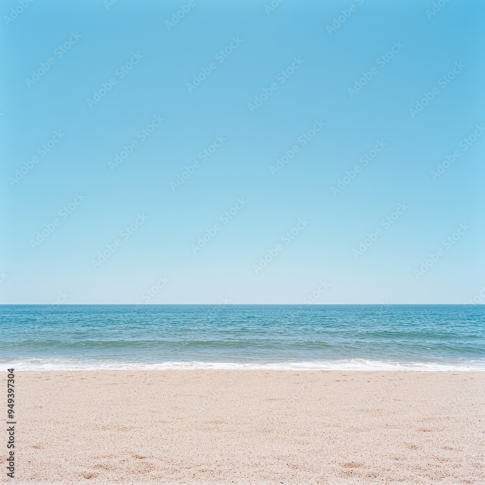 Sandy Beach with Clear Blue Sky and Ocean Sandy Beach with Clear Blue Sky and Ocean