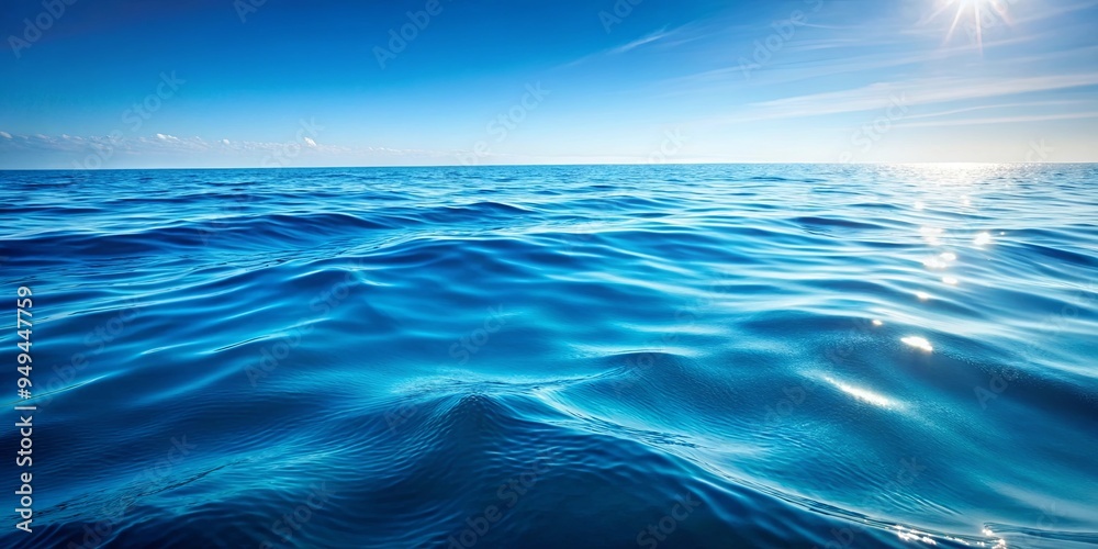 Blue water with gentle waves creating a calming surface background Blue water with gentle waves creating a calming surface background