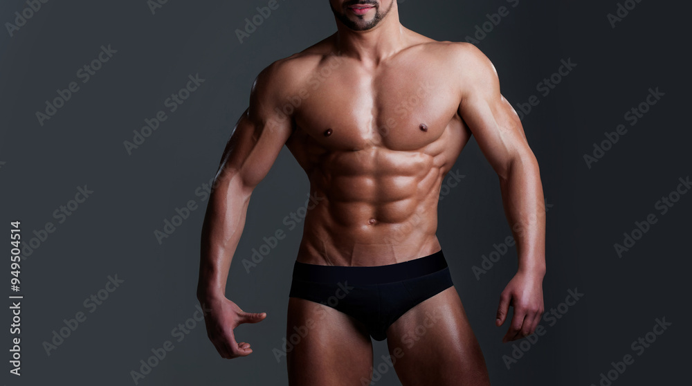 Six pack. Perfect abs, shoulders, and chest. Close up the Abs. Closeup torso. Ab. Muscular torso and ripped abs. Sexy male muscular body. Man with naked torso showing six pack abs. Six pack. Perfect abs, shoulders, and chest. Close up the Abs. Closeup torso. Ab. Muscular torso and ripped abs. Sexy male muscular body. Man with naked torso showing six pack abs.