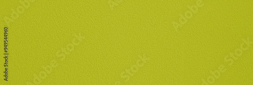 a seamless texture of slightly textured colored paper in muted chartreuse color