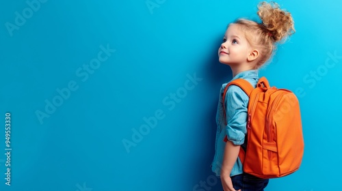 A schooler with a backpack photo