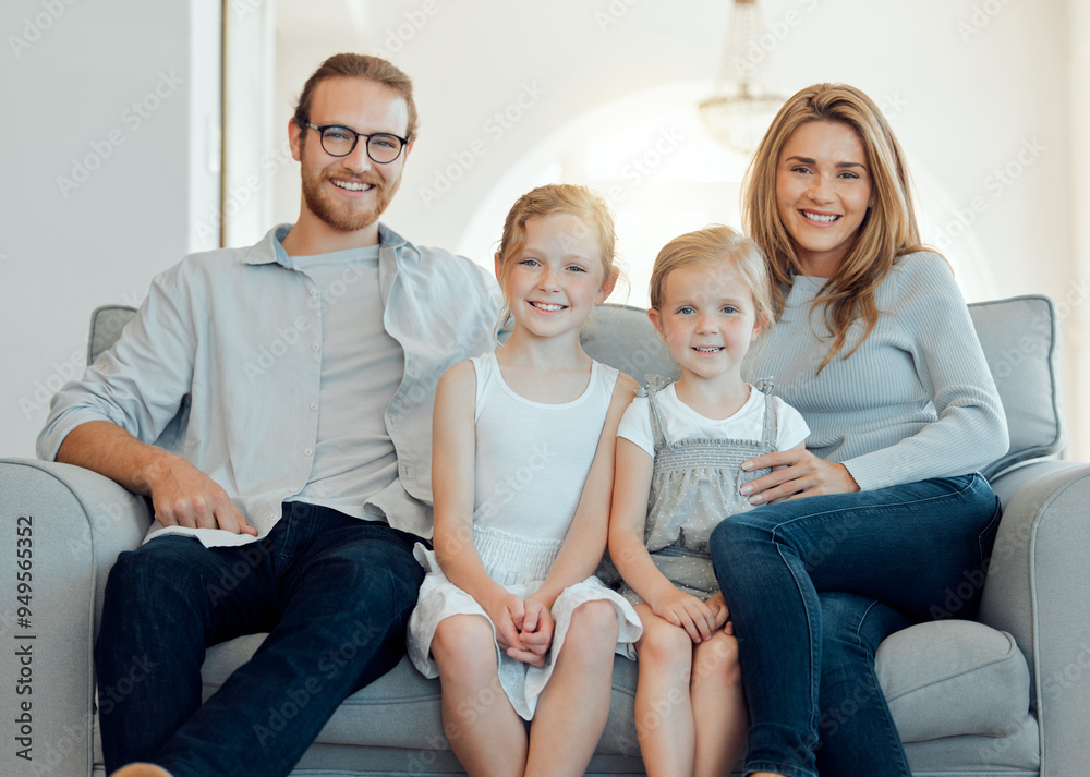Parents, girls and happy on sofa in portrait at home for bonding, support and care in England. People, family and smile with kids on couch in living room to relax or chill for child development Parents, girls and happy on sofa in portrait at home for bonding, support and care in England. People, family and smile with kids on couch in living room to relax or chill for child development