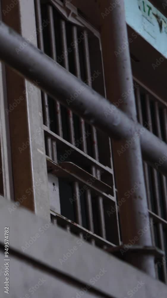Vertical View, Prison Cells and Metal Bars in Alcatraz Federal Penitentiary, California USA Vertical View, Prison Cells and Metal Bars in Alcatraz Federal Penitentiary, California USA