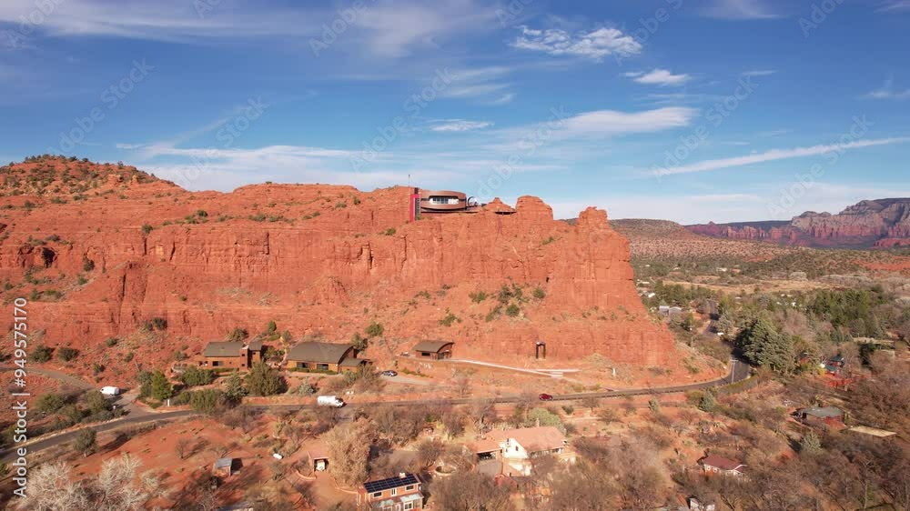 Drone Shot of House Atop Sandstone Cliff Above Road and Landscape of Sedona, Arizona USA Drone Shot of House Atop Sandstone Cliff Above Road and Landscape of Sedona, Arizona USA