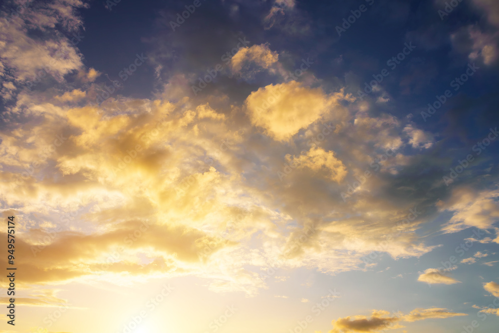 Fototapeta premium Dramatic cloudy sky at sunset or sunrise. Nature. Vintage film aesthetic.