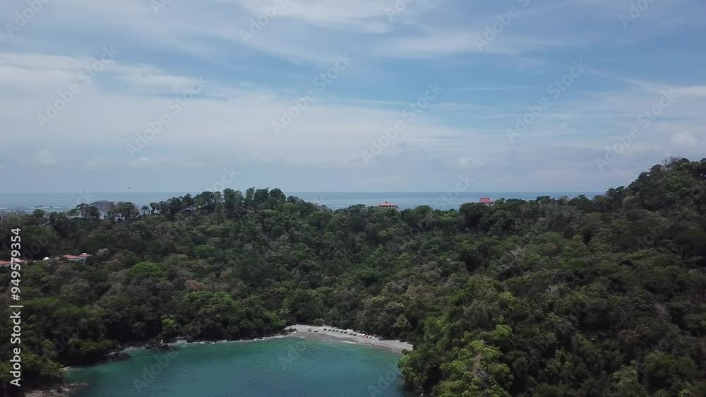 Aerial parallax shot of a hidden private beach near Manuel Antonio, Costa Rica Aerial parallax shot of a hidden private beach near Manuel Antonio, Costa Rica