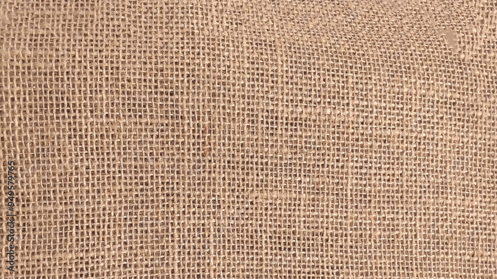 Close up burlap texture for background. Detail close up for dress or other modern fashion textile print. Beige textured design. Close up burlap texture for background. Detail close up for dress or other modern fashion textile print. Beige textured design.
