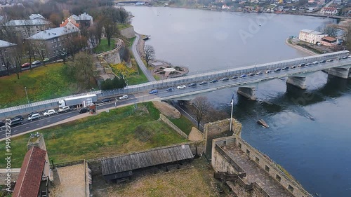 A bridge between Estonia and Russia.
The line of cars is waiting to pass to Estonia.
Narva and Ivangorod.