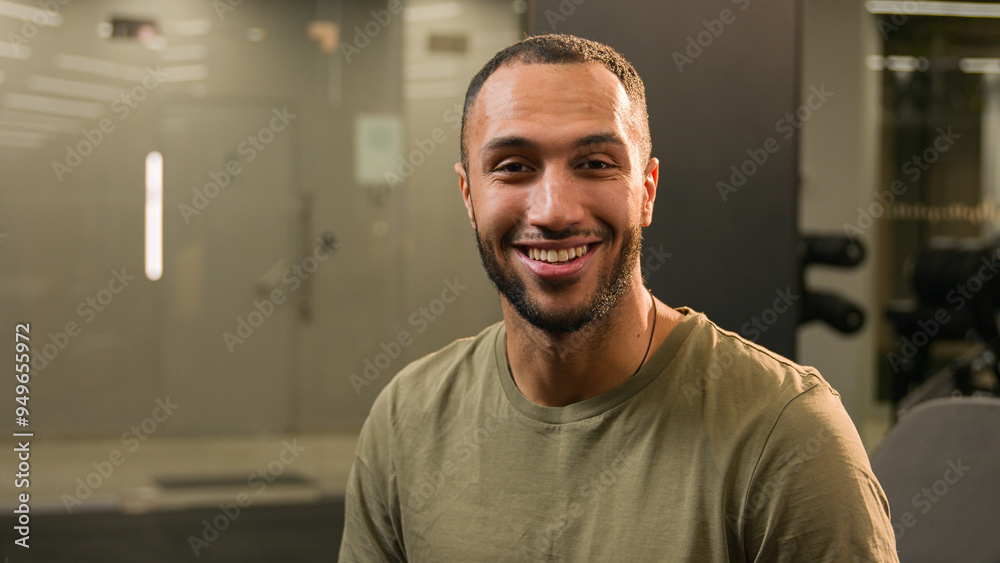 Sport channel video blog fitness vlog stream Latino American man guy athlete sportive fit instructor blogger vlogger influencer in gym talking at camera online workout training exercise tutorial chat