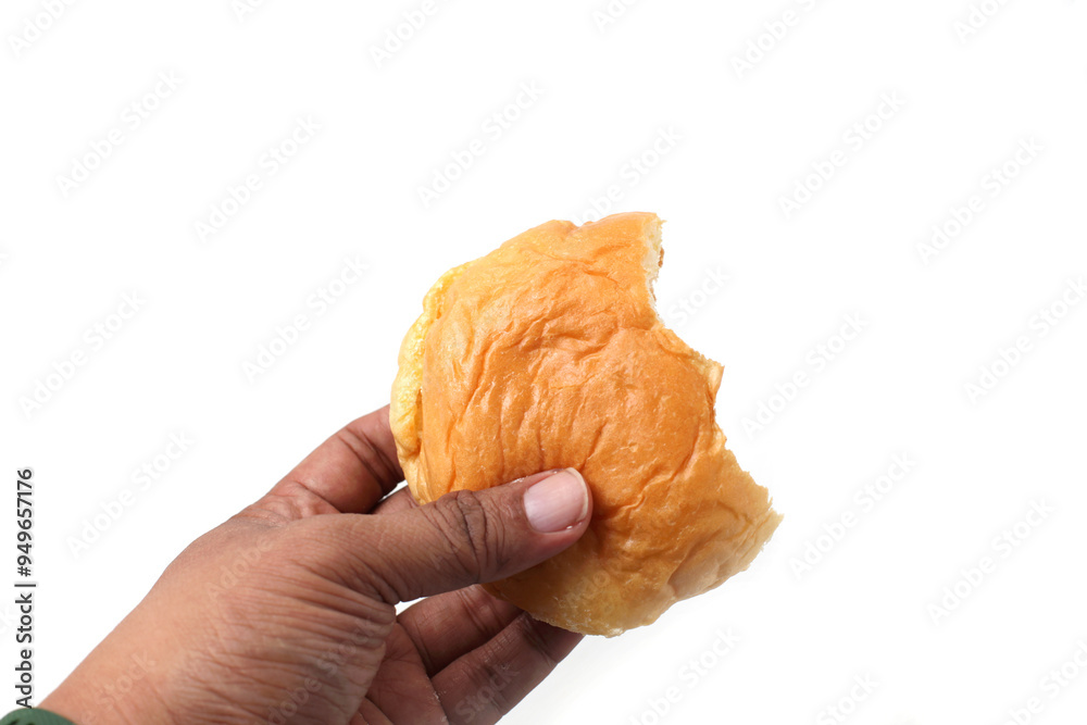 hand holding bread with butter and sugar isolated on white background, good for article, recipe and commercial hand holding bread with butter and sugar isolated on white background, good for article, recipe and commercial