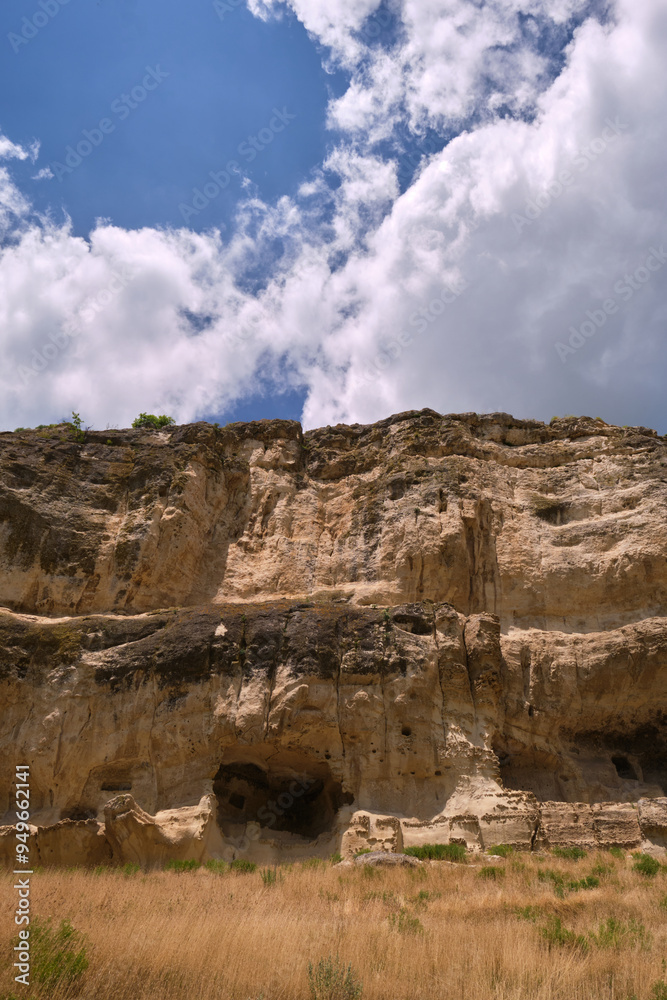 Fototapeta premium Mountain landscape with white clouds