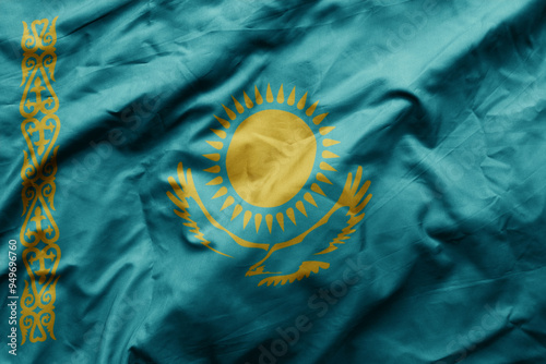 waving colorful realistic national flag of kazakhstan . photo