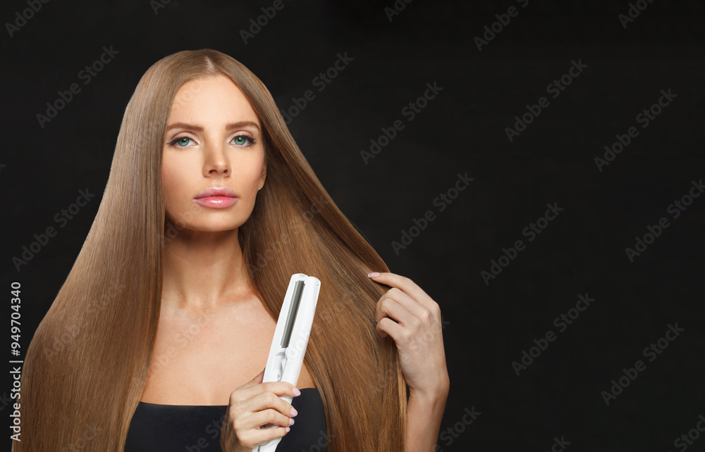 Obraz premium Face of woman with hair straightener iron in studio isolated on black background. Haircare, wellness and young female model with flat iron for salon treatment hairstyle, styling and hair care