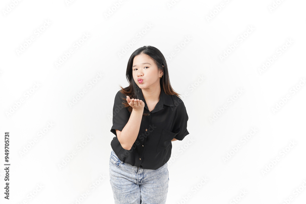 Young Asian woman blowing kiss wearing Black t-shirt and jeans isolated on white background Young Asian woman blowing kiss wearing Black t-shirt and jeans isolated on white background