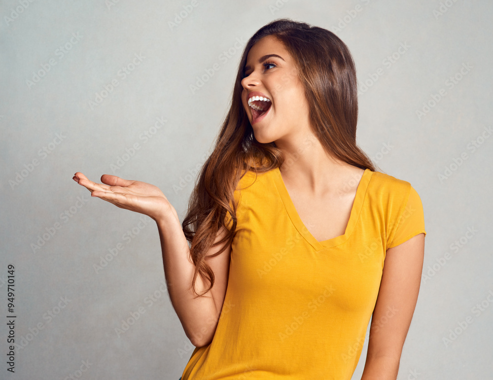 Happy, woman and hand with presentation in studio for announcement, information and marketing. Female person, smile and excited with mockup space for news, advertising or promotion on gray background Happy, woman and hand with presentation in studio for announcement, information and marketing. Female person, smile and excited with mockup space for news, advertising or promotion on gray background